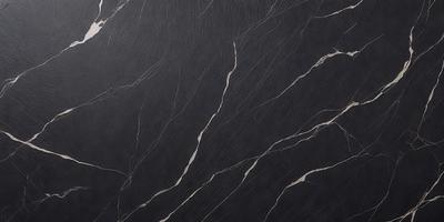 The primary subject of the image is a close-up of a black marble countertop. The setting is a kitchen, and the visual style is a photo. The countertop has a black and white pattern, and the overall atmosphere is elegant and sophisticated.