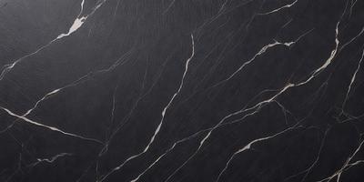 The primary subject of the image is a close-up of a black marble countertop. The setting is a kitchen, and the visual style is a photo. The countertop has a black and white pattern, and the overall atmosphere is elegant and sophisticated.