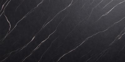The primary subject of the image is a close-up of a black leather surface. The setting is a black background, which creates a striking contrast with the leather. The visual style is a photo, showcasing the leather's texture and details. The colors in the image are predominantly black, giving it a sleek and modern appearance.