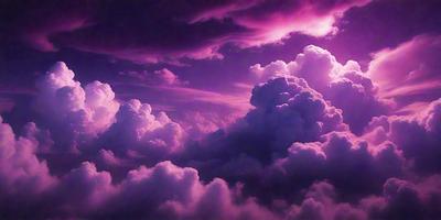 The primary subject of the image is a purple cloudy sky with a few clouds. The setting is a cloudy sky, and the visual style is a photo. The colors and mood of the image are predominantly purple, creating a serene and calming atmosphere.