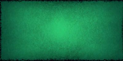 The primary subject of the image is a green background with a pattern of green and white. The setting is a close-up of the green background, which creates a visually appealing and vibrant scene. The visual style of the image is a combination of a photo and digital art, as it appears to be a close-up of a patterned surface. The colors and mood of the image are predominantly green, creating a calm and soothing atmosphere.