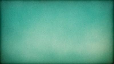The primary subject of the image is a large, empty, and dark blue sky. The setting is a vast, open space with no visible landmarks or objects. The visual style is a close-up of the sky, which gives a sense of depth and vastness. The colors and mood of the image are predominantly dark and moody, with the blue sky serving as the main focal point.