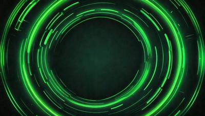 The primary subject of the image is a green circle, which appears to be a neon or glowing circle. The setting is a dark background, which contrasts with the bright green circle. The visual style is a close-up of the green circle, emphasizing its vibrant color. The colors and mood of the image are predominantly green, creating a lively and energetic atmosphere.