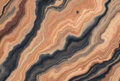 The primary subject of the image is a close-up of a wooden surface with a unique and intricate pattern. The setting is a wooden table, and the visual style appears to be a close-up of a natural material. The colors and mood of the image are predominantly earthy tones, giving it a natural and organic feel.
