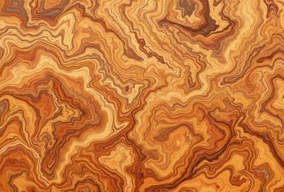 The primary subject of the image is a wooden surface with a unique and intricate pattern. The setting is a close-up view of the wooden surface, showcasing the detailed design. The visual style is a close-up of the wooden surface, which gives a sense of depth and texture. The colors and mood of the image are warm and earthy, with the wooden surface being the dominant color.