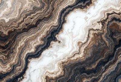 The primary subject of the image is a marble-like stone with a patterned texture. The setting is a natural environment, possibly a rock formation or a stone wall. The visual style is a close-up of the stone, showcasing its intricate pattern. The colors and mood of the image are predominantly earthy tones, giving it a natural and organic feel.