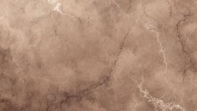 The image features a brown marble-like surface with a patterned texture. The primary subject is the surface, which appears to be a wall or a countertop. The setting is indoors, with the surface being the main focus of the image. The visual style is a close-up of the surface, showcasing its unique pattern and texture. The colors in the image are predominantly brown, giving the surface a warm and natural appearance.