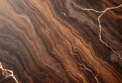 The primary subject of the image is a close-up of a wooden surface, possibly a table or a piece of wood. The setting is a room with a wooden floor, and the visual style appears to be a photo of the wooden surface. The colors and mood of the image are dominated by the wooden tones, giving it a warm and natural atmosphere.