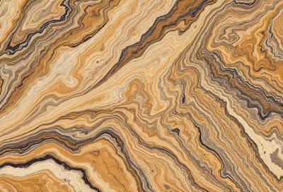 The primary subject of the image is a close-up of a marble-like stone with a unique, swirling pattern. The setting is a natural environment, possibly a rock formation or a stone surface. The visual style is a close-up of the stone, showcasing its intricate and captivating design. The colors and mood of the image are warm and earthy, with the swirling pattern adding a sense of depth and texture to the stone.