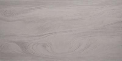 The primary subject of the image is a large, curved, and textured surface, which appears to be a piece of art or a drawing. The setting is a white background, which provides a clean and minimalist appearance. The visual style is a combination of digital art and illustration, as the surface has a unique and intricate design. The colors and mood of the image are predominantly white, giving it a clean and serene atmosphere.
