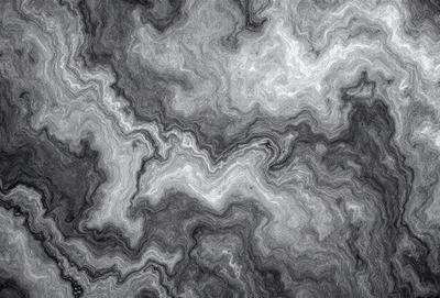 The image features a close-up of a marbled surface, possibly a piece of marble or a marbled wall. The surface has a patterned texture, giving it a unique and intricate appearance. The colors in the image are predominantly grays and blacks, creating a moody and dramatic atmosphere. The focus of the image is on the marbled surface, with no other objects or elements visible in the frame.
