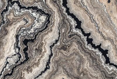 The primary subject of the image is a marble-like pattern, which is the main object, scene, or focus of the image. The setting or background features a marble-like surface, which adds to the visual style of the image. The colors and mood of the image are predominantly dark, with a sense of depth and intricacy in the pattern.