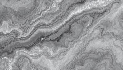 The image features a gray and white marble patterned surface, which appears to be a stone or marble tile. The pattern is intricate and visually appealing, creating a unique and elegant appearance. The overall atmosphere of the image is sophisticated and elegant, with the marble pattern serving as the primary subject.