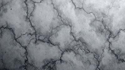 The primary subject of the image is a large, textured surface with a cloudy, gray appearance. The setting is a cloudy sky, and the visual style is a combination of a photo and a drawing. The colors and mood of the image are predominantly gray and moody, creating a dramatic and atmospheric scene.