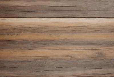 The primary subject of the image is a wooden floor with a striped pattern. The setting is a room with a wooden surface, possibly a wall or a floor. The visual style is a close-up of the wooden floor, showcasing its texture and pattern. The colors and mood of the image are warm and natural, with the wooden floor being the main focus.