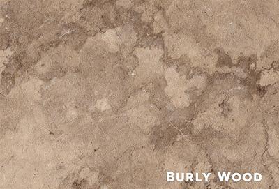 The image features a marble-like surface with a pattern of holes and a brown color. The surface appears to be a combination of marble and wood, giving it a unique and textured appearance. The primary subject of the image is the marble-like surface, which serves as the main focus of the image. The setting is a room with a brown color scheme, which complements the surface. The visual style of the image is a combination of marble and wood, creating a distinct and eye-catching pattern. The colors and
