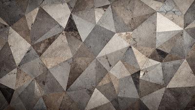 The primary subject of the image is a patterned surface, which appears to be a textured wall or a carpet. The setting is indoors, with the patterned surface being the main focus of the image. The visual style is a combination of photo and digital art, creating a unique and intricate design. The colors and mood of the image are predominantly neutral, with a touch of brown and grey, giving it a calm and sophisticated atmosphere.