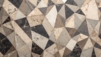 The primary subject of the image is a patterned floor, which features a geometric design with a mix of black and white colors. The setting is a room with a marble floor, and the visual style appears to be a combination of a photo and digital art. The overall atmosphere is modern and sophisticated, with the black and white color scheme adding a touch of elegance to the space.