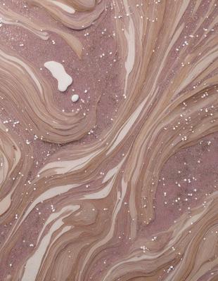 The primary subject of the image is a close-up of a sandy surface with a pattern of white and brown. The setting appears to be a beach or a desert-like environment. The visual style of the image is a combination of a photo and a digital art, creating a unique and intriguing pattern. The colors and mood of the image are predominantly warm and earthy, with the white and brown sand creating a sense of natural beauty.