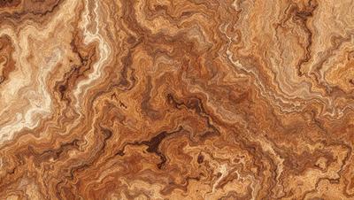 The primary subject of the image is a close-up of a wooden surface, possibly a table or a piece of wood, with a unique and intricate pattern. The setting appears to be indoors, with the wooden surface being the main focus of the image. The visual style is a close-up, which emphasizes the details of the wooden surface. The colors in the image are predominantly brown, which adds to the warm and natural atmosphere of the scene.