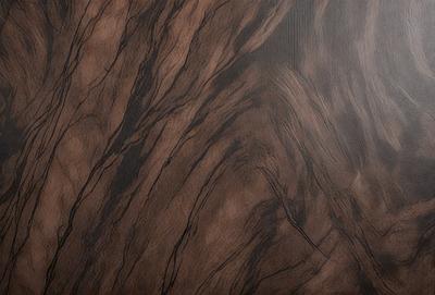 The primary subject of the image is a wooden surface with a unique and intricate pattern. The setting is a close-up of the wooden surface, showcasing the details of the pattern. The visual style is a close-up of the wooden surface, which gives a sense of depth and texture. The colors and mood of the image are predominantly brown, creating a warm and natural atmosphere.