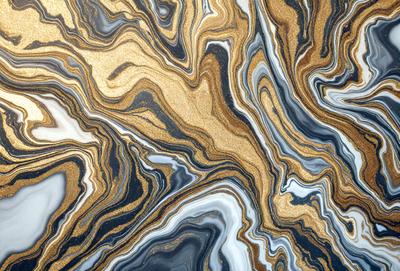 The primary subject of the image is a marble-like pattern with gold and black colors. The setting is a marble-like surface, which could be a wall, table, or countertop. The visual style is a close-up of the marble pattern, showcasing its intricate details. The colors and mood of the image are elegant and sophisticated, with the gold and black colors creating a luxurious and timeless atmosphere.