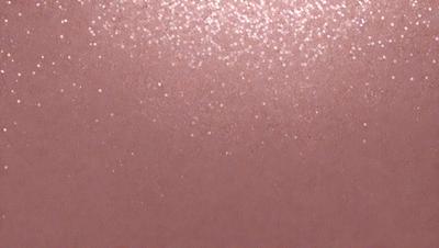 The primary subject of the image is a close-up of a pink surface with a pattern of glittering, shiny specks. The setting appears to be a room with a pink wall, and the visual style is a combination of a photo and digital art. The dominant colors in the image are pink and the glittering specks, creating a warm and inviting atmosphere.
