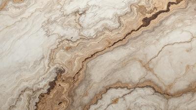 The primary subject of the image is a marble countertop with a unique and intricate pattern. The setting is a kitchen or bathroom, as the countertop is a prominent feature in the scene. The visual style is a close-up of the marble countertop, showcasing its texture and design. The colors and mood of the image are predominantly neutral, with the marble countertop being the main focus and source of visual interest.