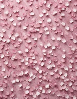 The primary subject of the image is a pink background with a pattern of pink petals. The setting is a pink surface, which creates a visually appealing and warm atmosphere. The visual style of the image is a combination of photo and digital art, as it features a close-up of the pink petals on the pink background. The colors and mood of the image are predominantly pink, creating a sense of warmth and softness.