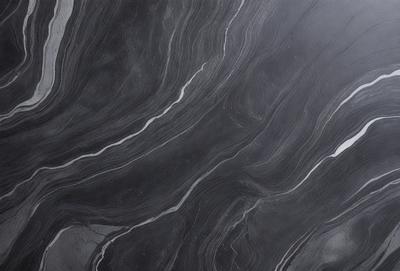 The primary subject of the image is a black and white marble pattern. The setting is a black background, which contrasts with the marble pattern. The visual style is a close-up of the marble pattern, showcasing its intricate details. The colors and mood of the image are predominantly dark and moody, with the marble pattern providing a sense of depth and texture.