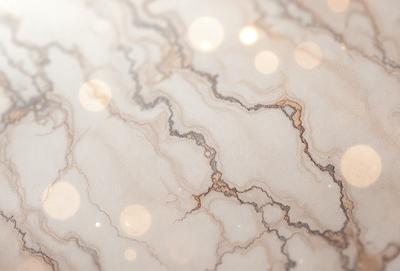 The primary subject of the image is a marble surface with a pattern of white and brown swirls. The setting is a room with a white marble wall, and the visual style is a close-up of the marble surface. The colors and mood of the image are predominantly white and brown, giving it a natural and elegant appearance.