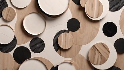 The primary subject of the image is a collection of white and black circles arranged on a wooden surface. The circles are of various sizes and are placed in a visually appealing manner. The setting is a wooden table, and the visual style appears to be a combination of a photo and digital art. The dominant colors in the image are white and black, creating a contrasting and visually striking scene.