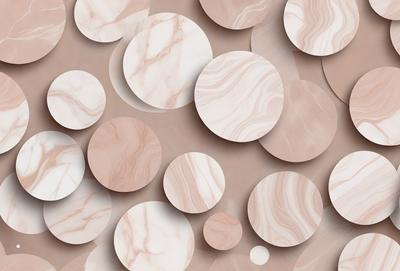The primary subject of the image is a collection of circles, which are arranged in various sizes and shapes. The circles are made of marble and are placed on a surface that appears to be a combination of marble and wood. The setting is a room with a patterned wall, which adds to the overall visual style of the image. The colors and mood of the image are predominantly neutral, with the marble circles providing a sense of elegance and sophistication.
