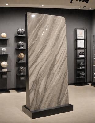 The primary subject of the image is a large, marble-like stone wall. The setting is a room with a display of various marble-like stones, including a large stone in the center of the room. The visual style is a combination of a photo and digital art, creating a unique and eye-catching display. The colors and mood of the image are predominantly dark, with the marble-like stones providing a contrasting and elegant touch to the overall atmosphere.