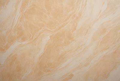 The primary subject of the image is a marble tile with a brown and white color scheme. The setting is a wall, and the visual style is a close-up of the tile. The colors and mood of the image are warm and natural, with the brown and white tones creating a sense of elegance and sophistication.