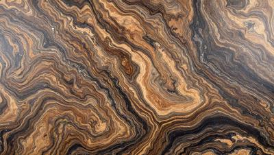 The primary subject of the image is a close-up of a wooden surface, possibly a table or a piece of wood, with a unique and intricate pattern. The setting appears to be indoors, with the wooden surface being the main focus of the image. The visual style is a close-up, which emphasizes the details of the wooden surface. The colors and mood of the image are predominantly earthy tones, giving it a natural and organic feel.