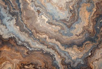 The primary subject of the image is a close-up of a marble-like stone surface. The setting is a rocky, textured surface with a mix of blue and brown colors. The visual style is a close-up of the stone, showcasing its intricate patterns and textures. The colors and mood of the image are a combination of earthy tones and a sense of natural beauty.