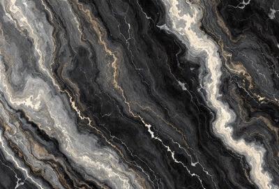 The primary subject of the image is a close-up of a marble stone with a black and white pattern. The setting is a rocky surface, and the visual style appears to be a photo. The colors and mood of the image are predominantly black and white, giving it a classic and timeless appearance.