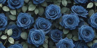 The primary subject of the image is a group of blue flowers, which are the main objects in the scene. The flowers are arranged in a pattern, creating a visually appealing display. The setting is a garden, with green leaves surrounding the flowers. The visual style of the image is a close-up of the flowers, showcasing their beauty and details. The dominant colors in the image are blue and green, giving the scene a calm and serene atmosphere.