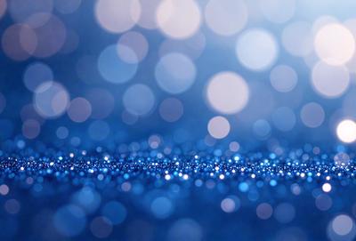 The primary subject of the image is a blue background with a pattern of blue lights. The setting appears to be a dark room, and the visual style is a digital art or illustration. The dominant colors are blue and white, creating a calm and serene atmosphere.