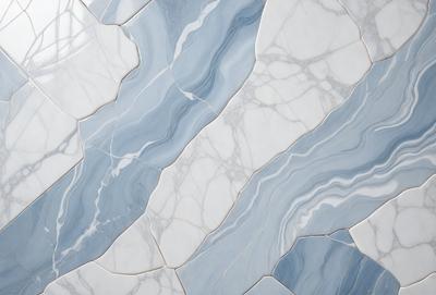 The primary subject of the image is a marble tile wall with a blue and white pattern. The setting is a bathroom, and the visual style is a photo. The dominant colors are blue and white, creating a clean and elegant atmosphere.