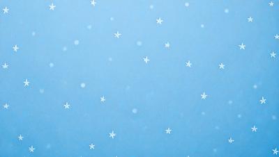 The primary subject of the image is a blue sky filled with white stars. The setting is a clear, cloudless sky, and the visual style is a natural, outdoor scene. The colors and mood of the image are predominantly blue and serene, creating a peaceful and tranquil atmosphere.