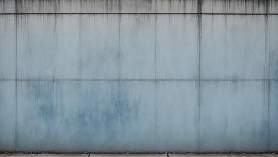 The primary subject of the image is a large, gray concrete wall. The setting is an outdoor environment, with the wall being the main object of focus. The visual style is a photo, capturing the concrete wall in its natural state. The colors and mood of the image are predominantly gray and neutral, giving it a somewhat dull and uninviting appearance.