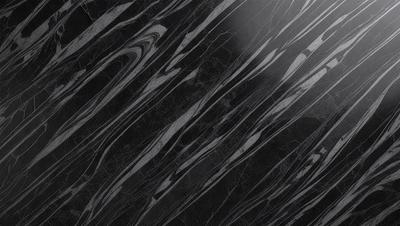 The primary subject of the image is a black and white marble pattern. The setting is a black background, which contrasts with the marble pattern. The visual style is a close-up of the marble pattern, showcasing its intricate details. The colors and mood of the image are predominantly black and white, giving it a classic and elegant appearance.