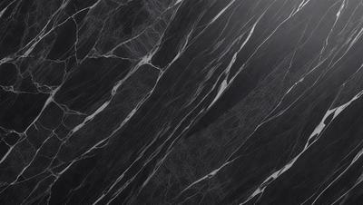 The primary subject of the image is a marble wall with a black background. The setting is a room with a black and white marble wall, which gives the room a sophisticated and elegant appearance. The visual style of the image is a black and white photo, which adds a timeless and classic feel to the scene. The colors and mood of the image are predominantly black and white, creating a sense of depth and contrast.