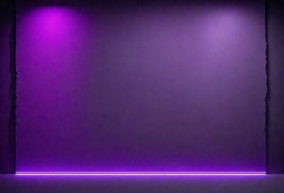 Purple wall with purple lighting.