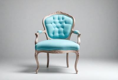 The primary subject of the image is a blue chair with a white frame. The chair is placed on a white background, giving it a clean and minimalist appearance. The visual style of the image is a photo, capturing the details of the chair and its surroundings. The colors and mood of the image are predominantly blue and white, creating a calm and serene atmosphere.