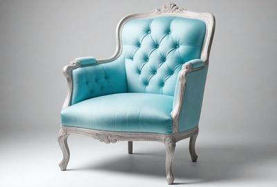 The primary subject of the image is a blue chair with a white frame. The chair is placed on a white surface, which serves as the background. The visual style of the image is a photo, capturing the details of the chair and its surroundings. The dominant colors in the image are blue and white, creating a calm and soothing atmosphere.