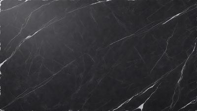 The primary subject of the image is a black marble countertop. The setting is a kitchen, with the countertop being the main focus of the scene. The visual style is a close-up of the marble countertop, showcasing its texture and appearance. The colors and mood of the image are predominantly dark, with the black marble countertop being the main source of contrast and visual interest.