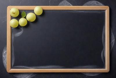 The primary subject of the image is a chalkboard with a black background. The setting is a table, and the visual style is a photo. The chalkboard is adorned with a few grapes, creating a colorful and inviting atmosphere. The overall mood of the image is warm and welcoming.